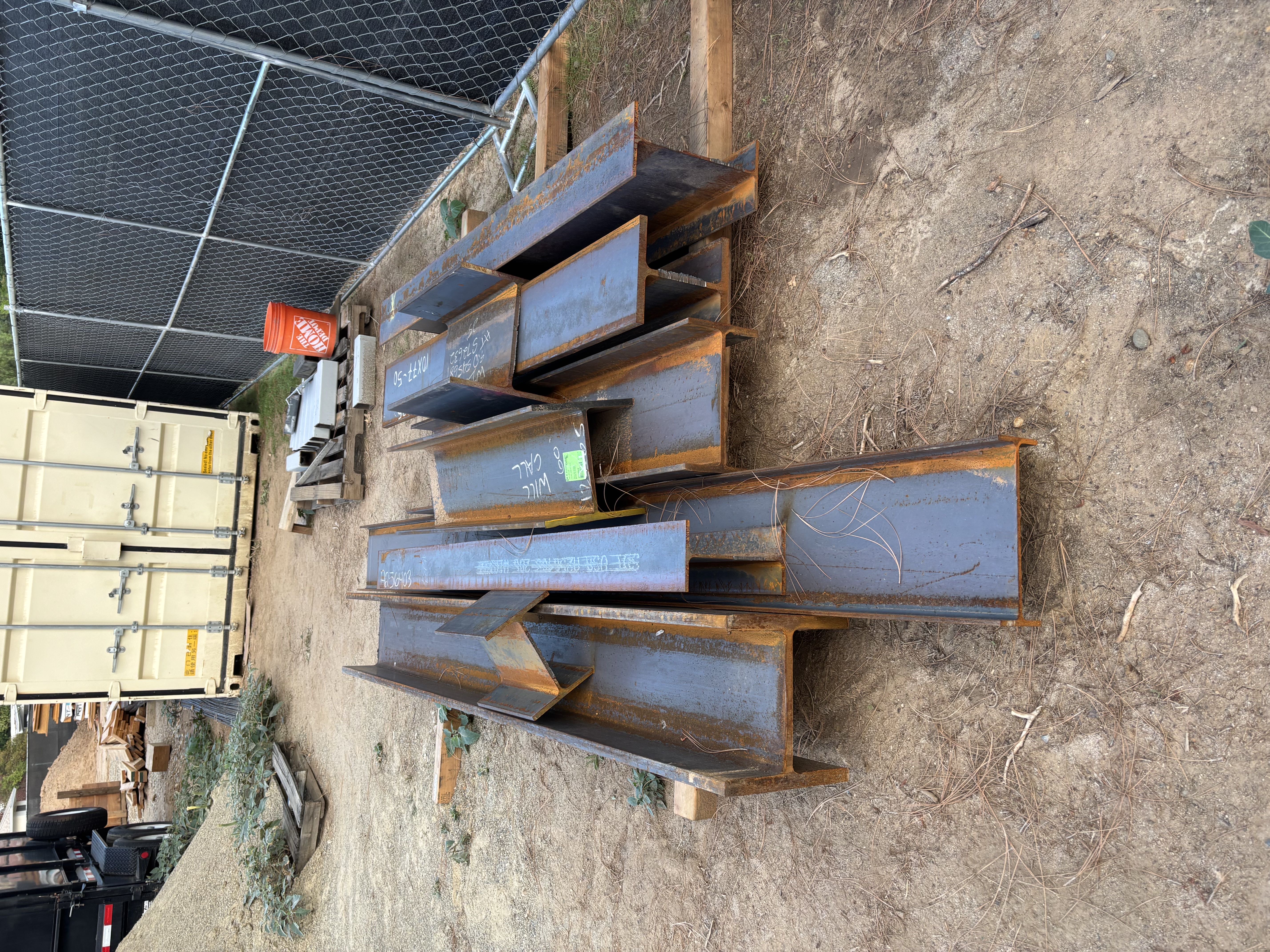 8 heavy-duty steel I-beams (W12x65)