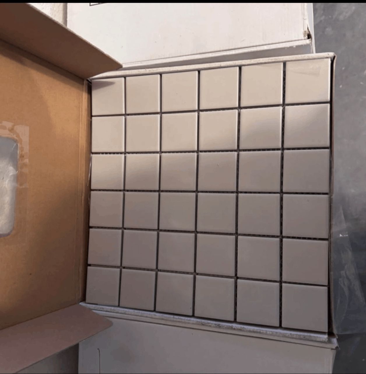 320 sq ft porcelain tile – 12x12 sheets– new in boxes – leftover from renovation – Color: Taupe