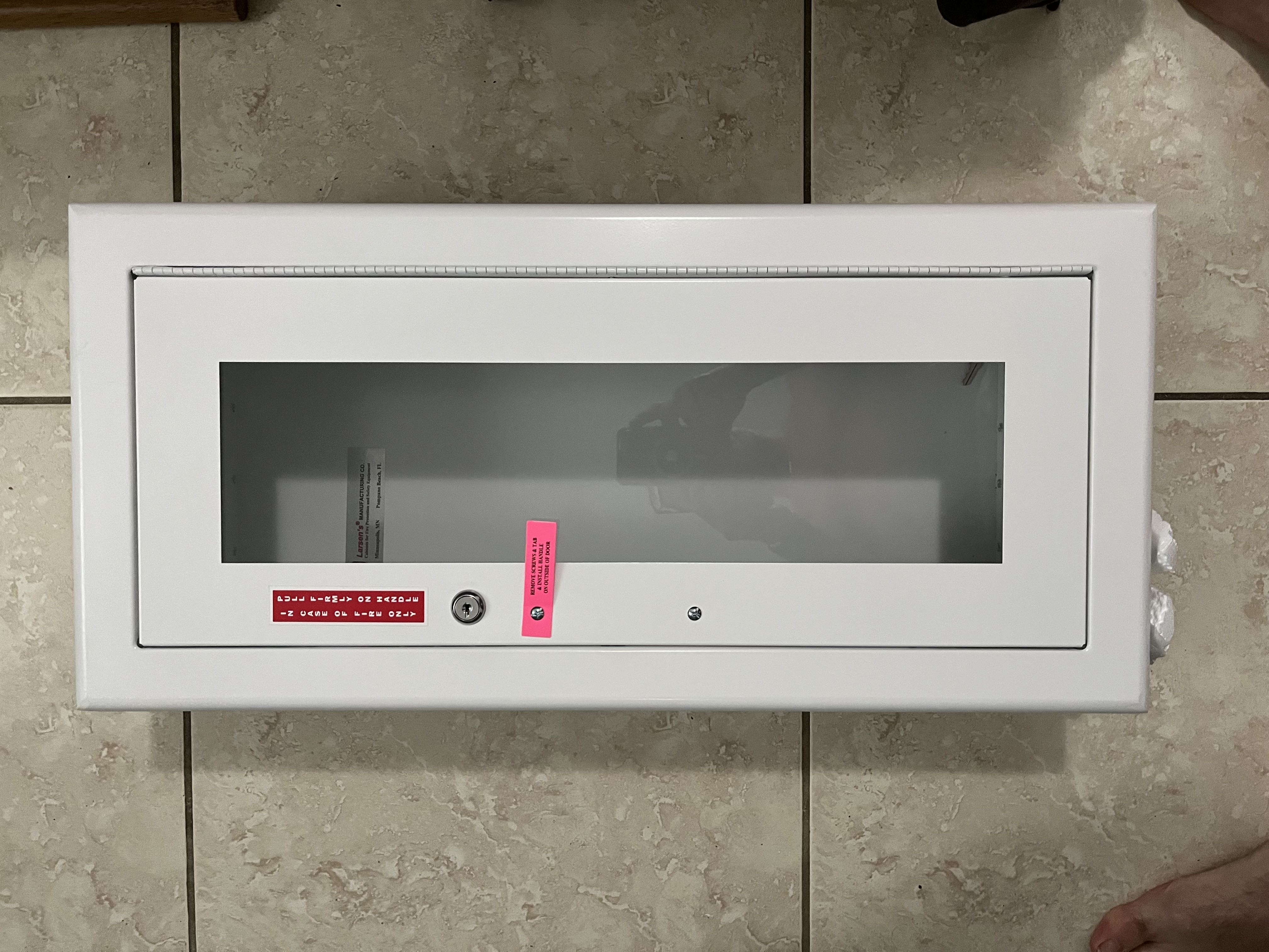 Fire extinguisher cabinets